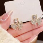 Diamond bow style earring
