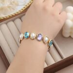 Elegant Pearl & Crystal Charm Bracelet - Image 2